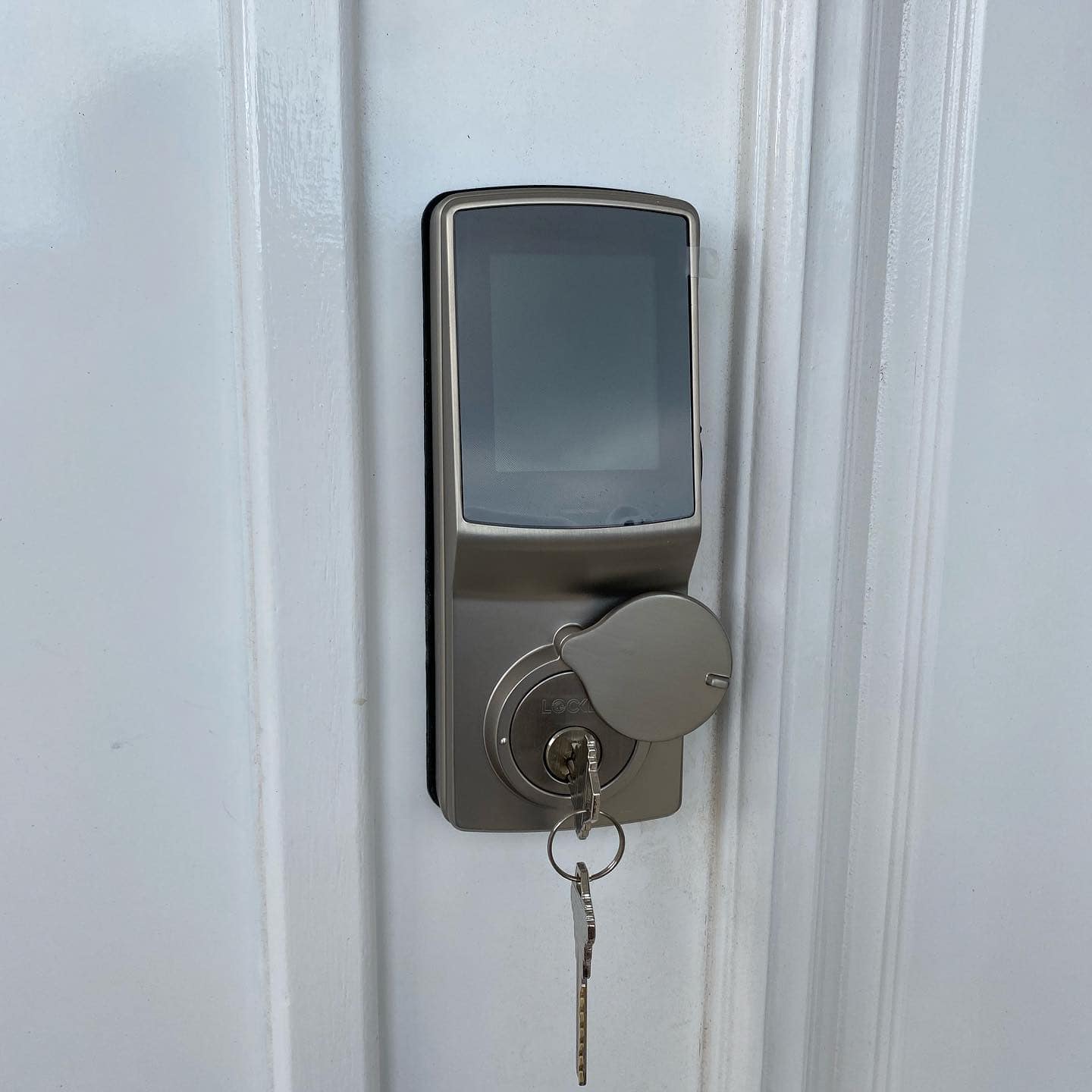 Lockly smart lock with a regular key option
